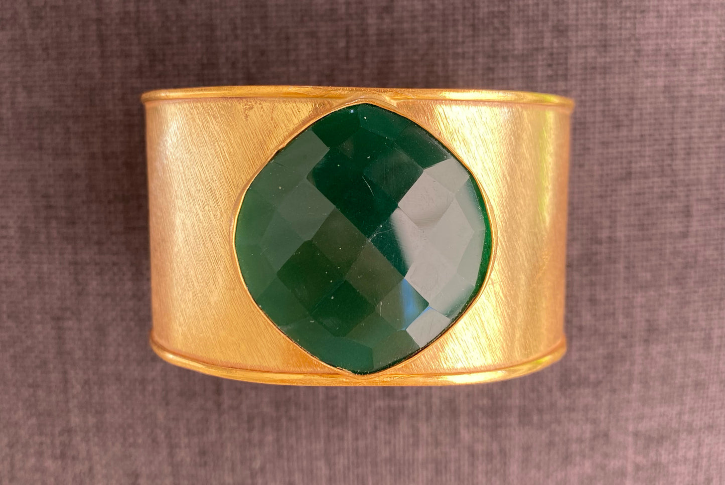 Gold bracelet with natural stone