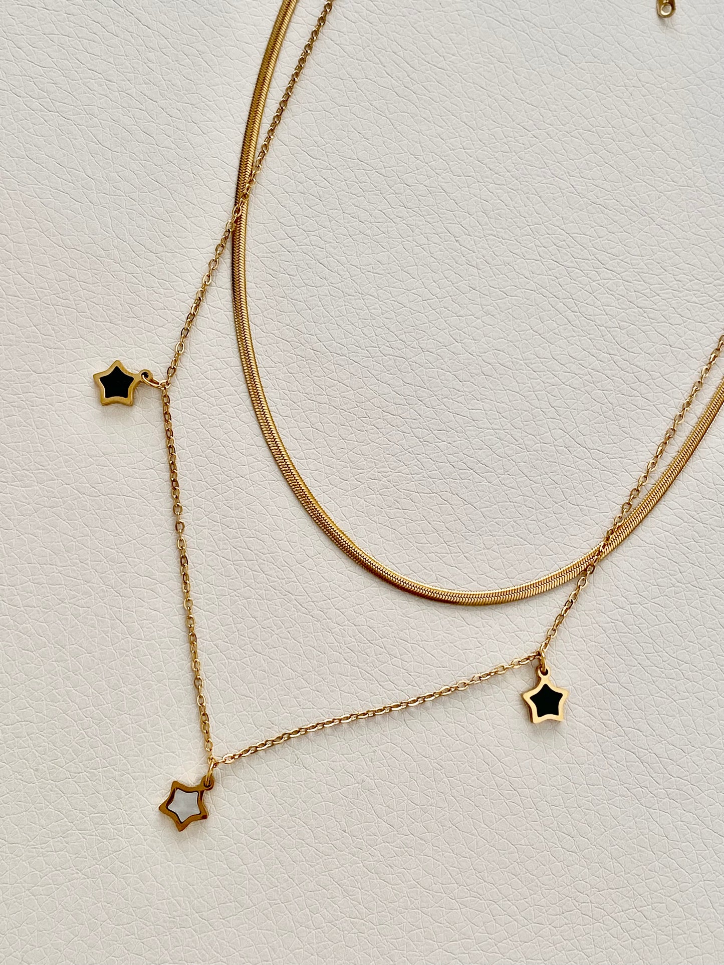 Doble collar dorado con estrellitas