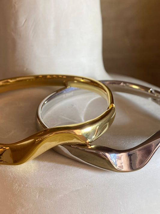 Gold and silver bracelets