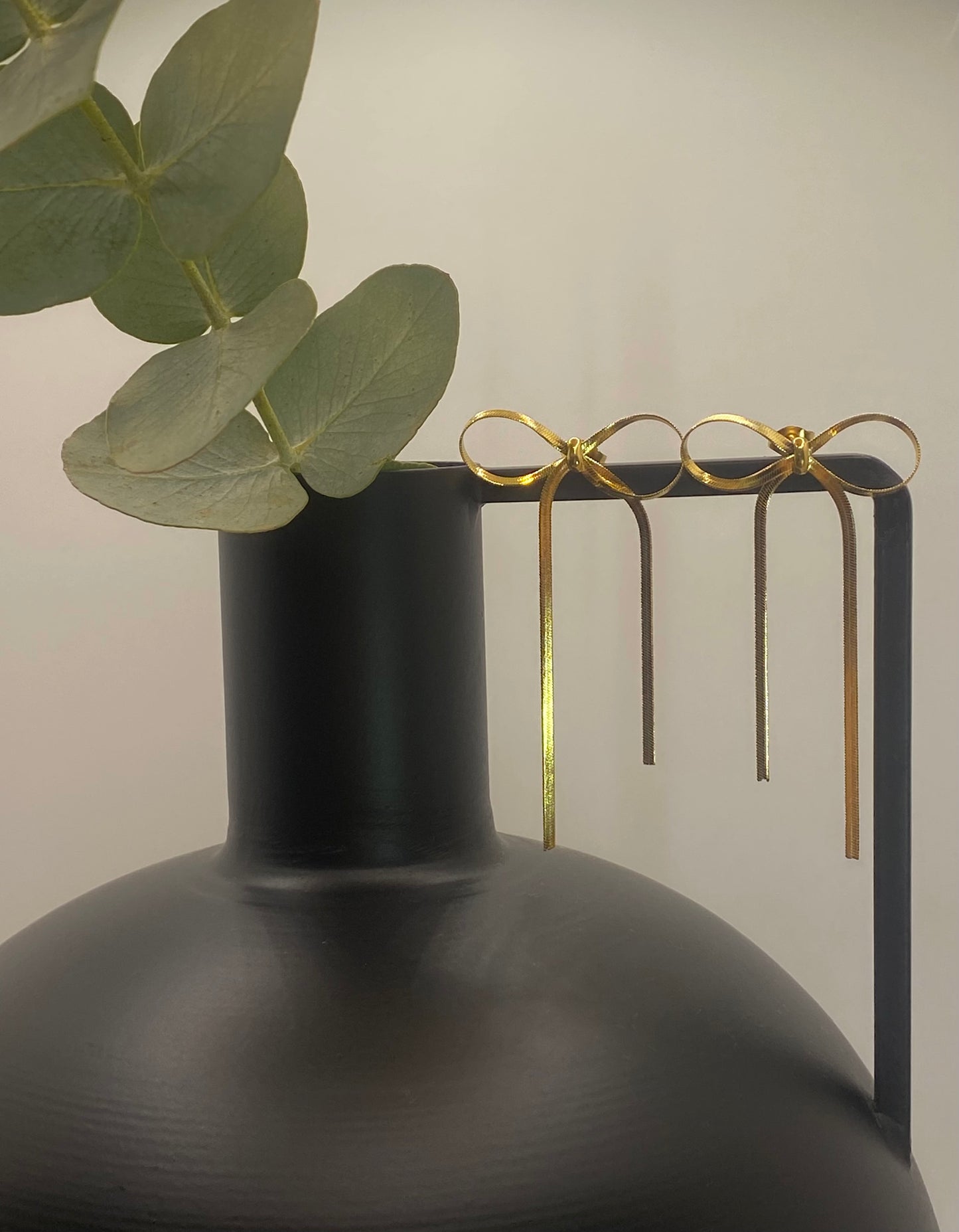 Pendientes dorados lacitos