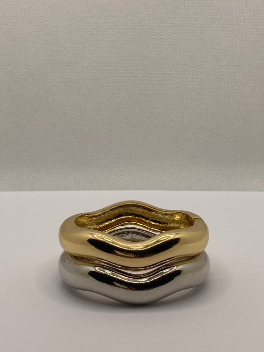 Gold and silver rigid bracelets