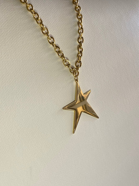 Long gold necklace with star