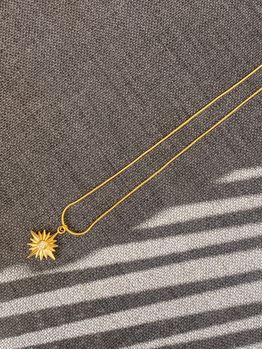 Chain with star and zirconia pendant