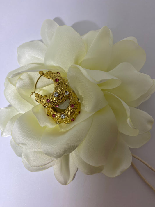 Pendientes dorados con circonitas rosas
