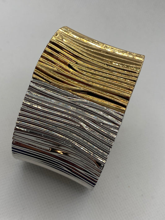 Gold and silver rigid bracelet