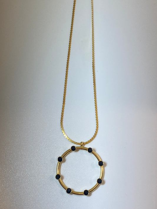 Round gold pendant with zirconia details