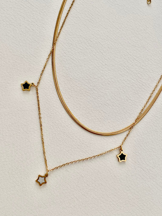 Double golden necklace with little stars