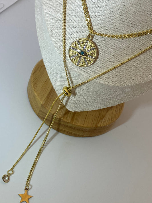 Double gold necklace with eye detail