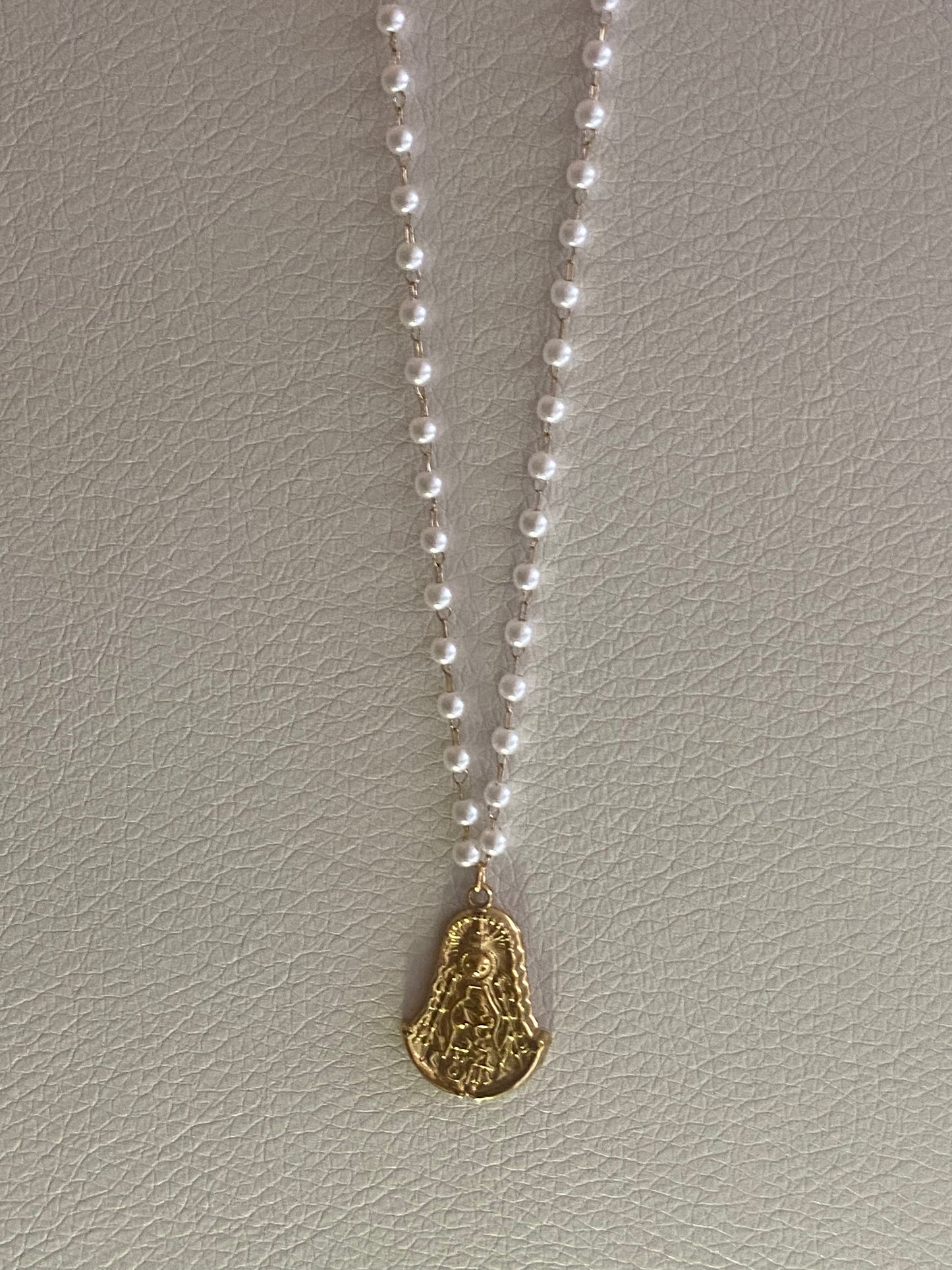 Virgin of Rocío with a chain of pearls