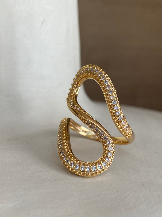Gold ring with zircons