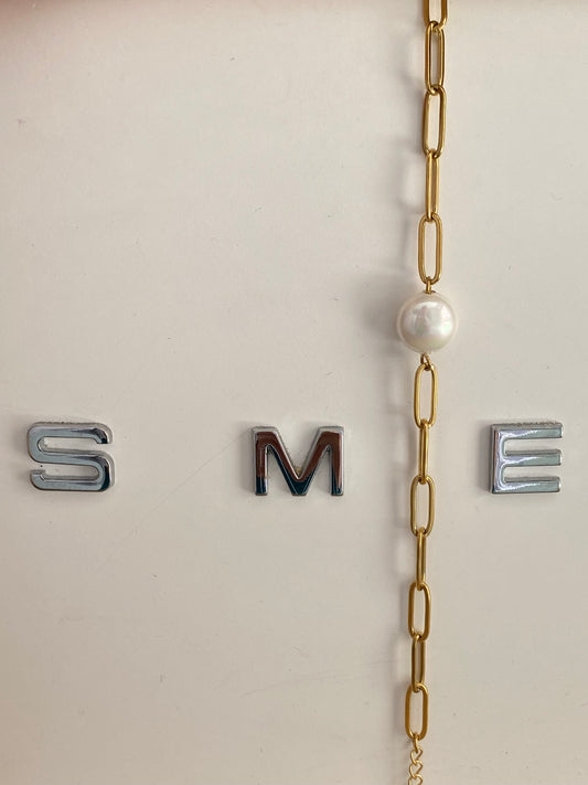 Pulserita cadena con perla