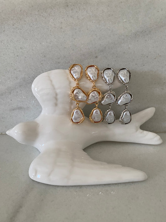 Pendientes largos detalles perlas