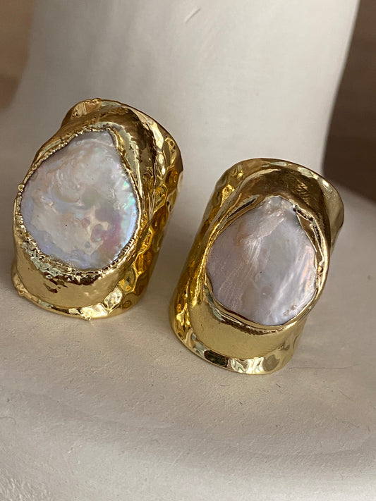Gold ring with pearly natural stone