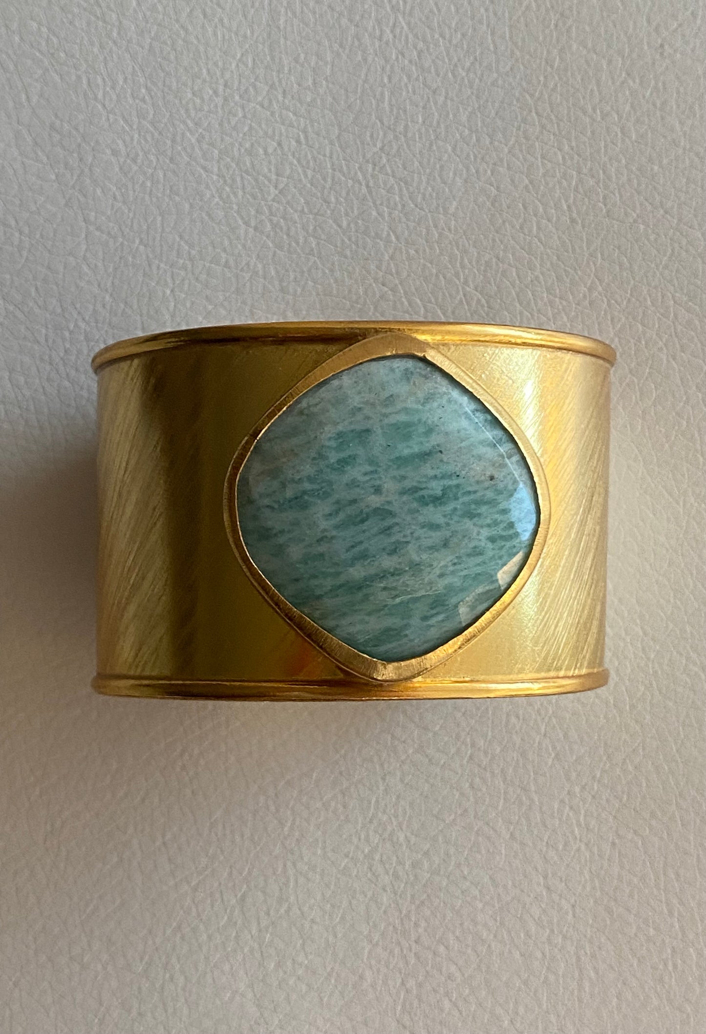 Gold bracelet with natural stone