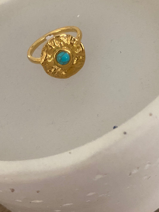 Anillo medalla con detalle azul