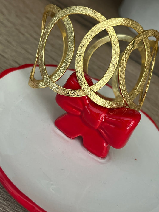 Brazalete dorado círculos